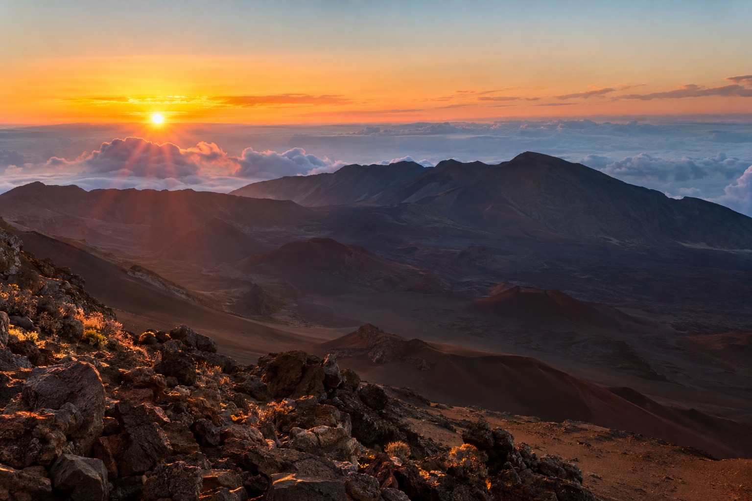 Sunrise light over the crater at the summit of Haleakala National Park