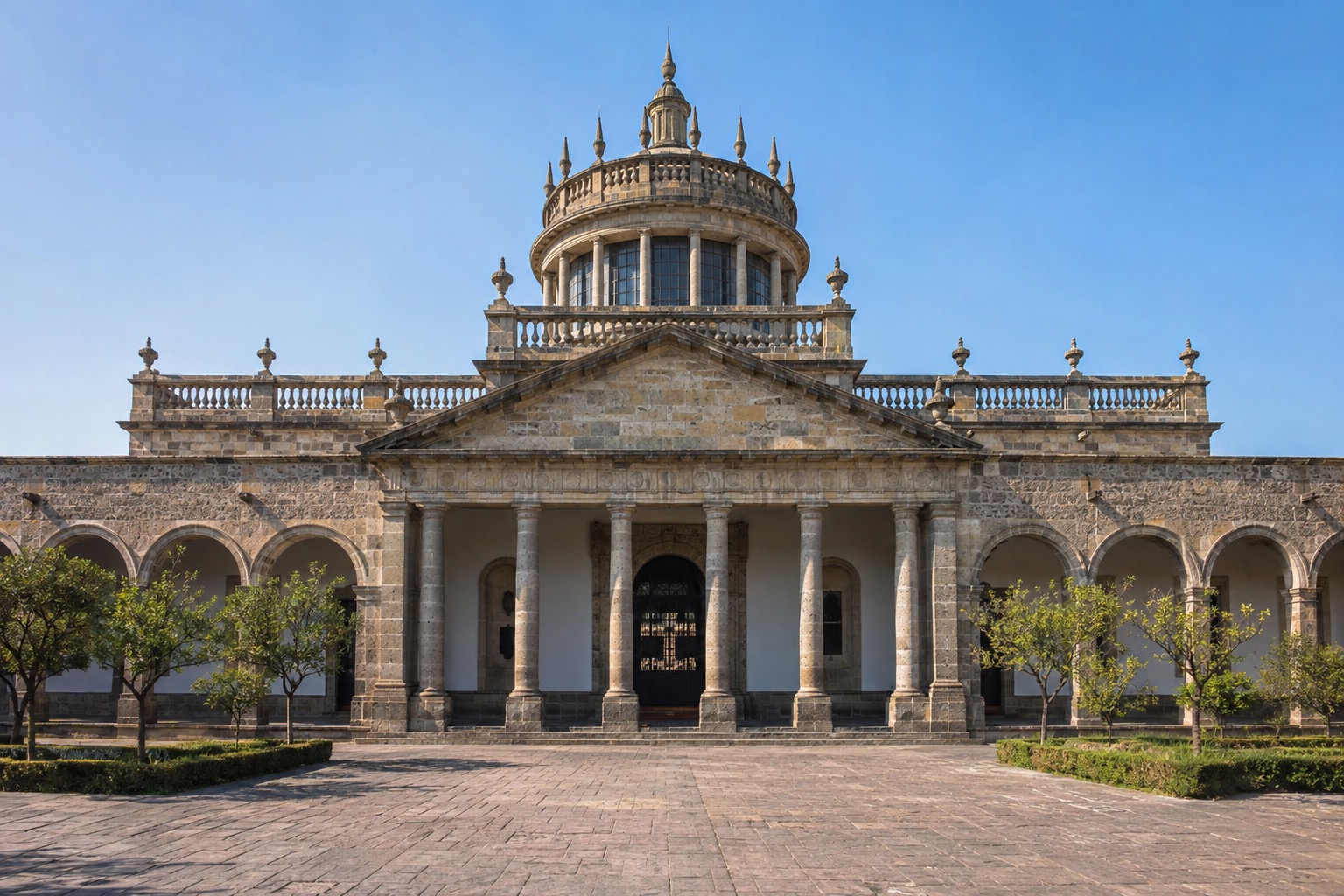 Neoclassical facade of the Hospicio Cabañas in Guadalajara under a clear sky