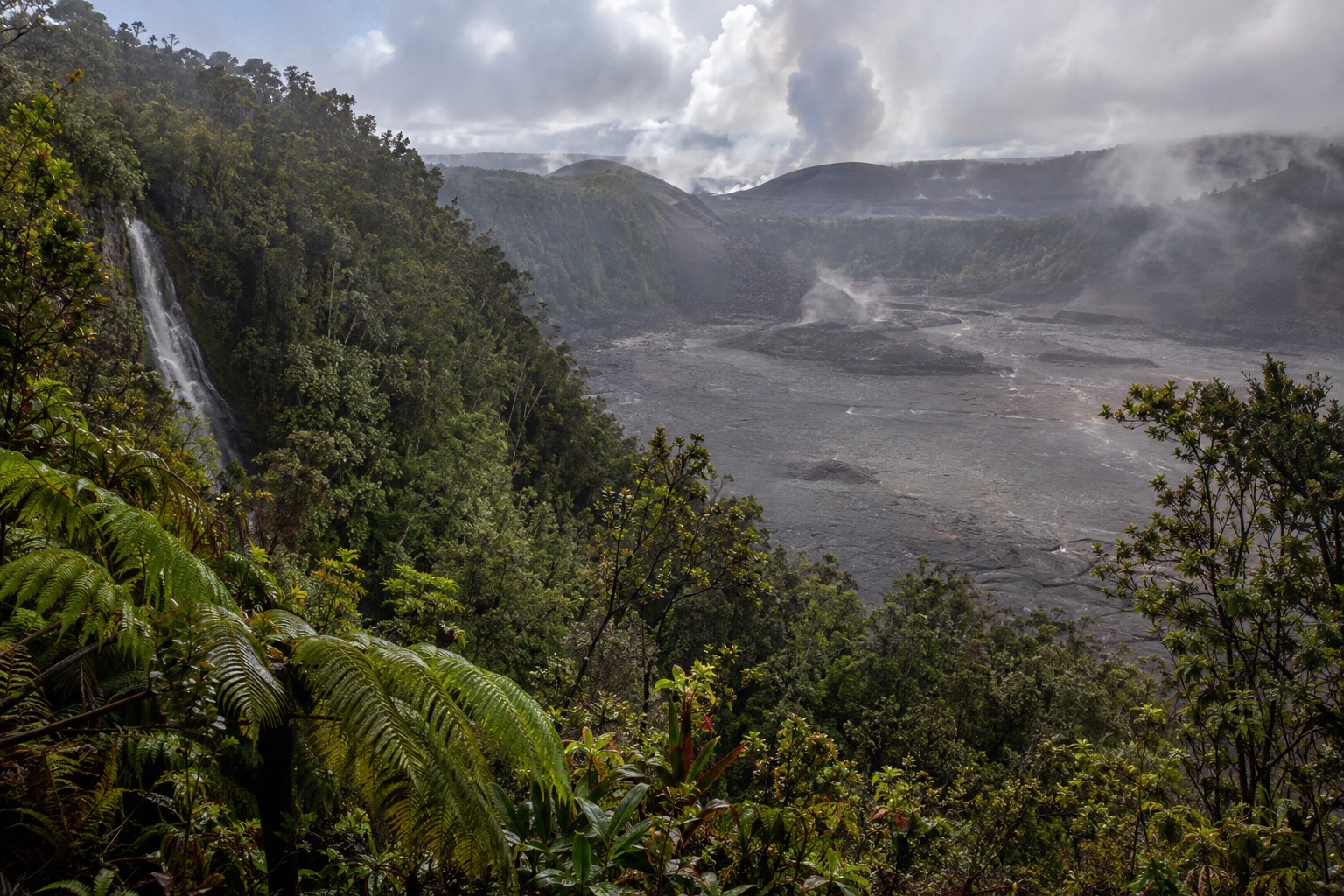 Mist clinging to the rim of Kilauea Iki crater at Hawaii Volcanoes National Park
