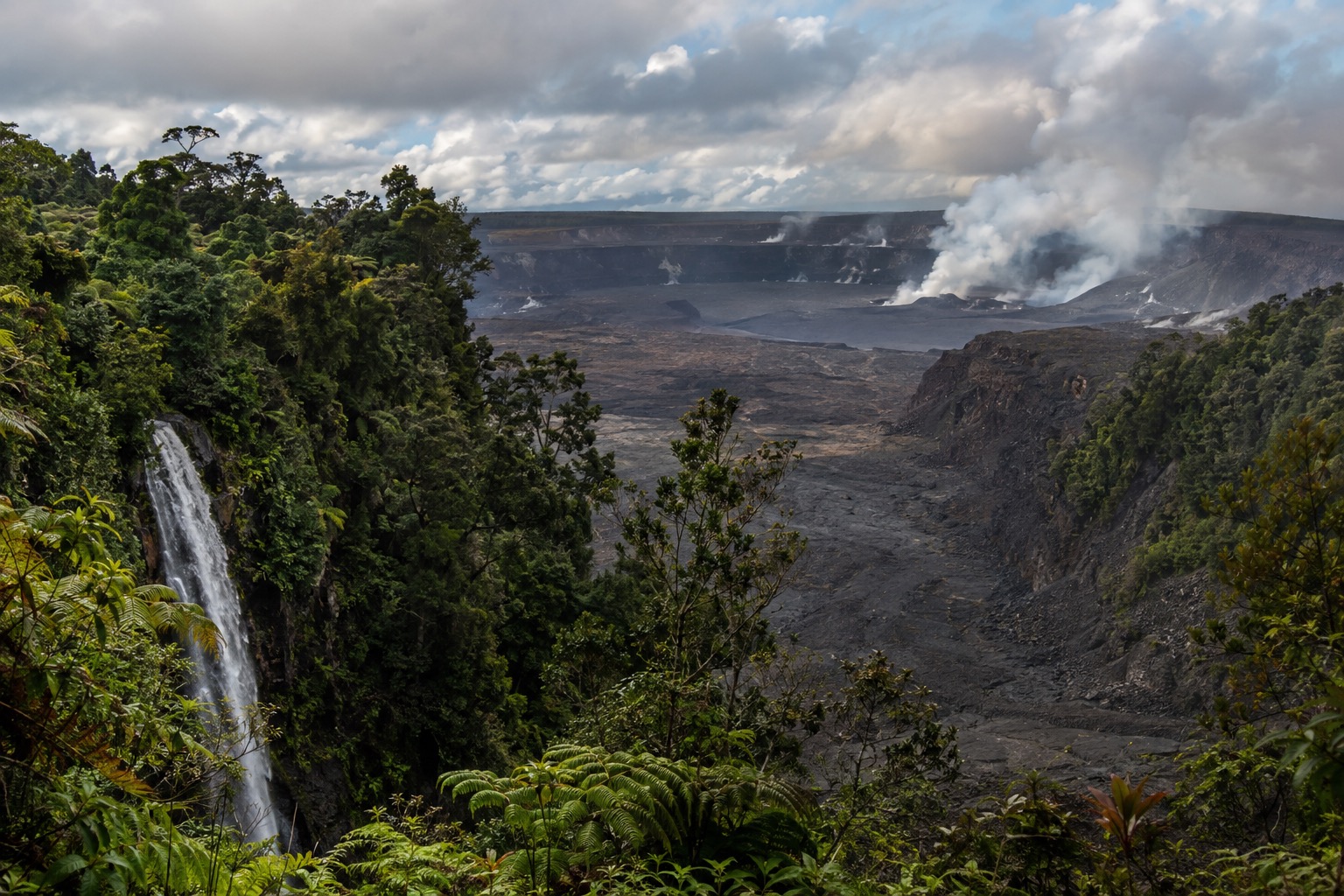 Steam and gas drifting from vents along the Kilauea summit caldera at Hawaii Volcanoes National Park