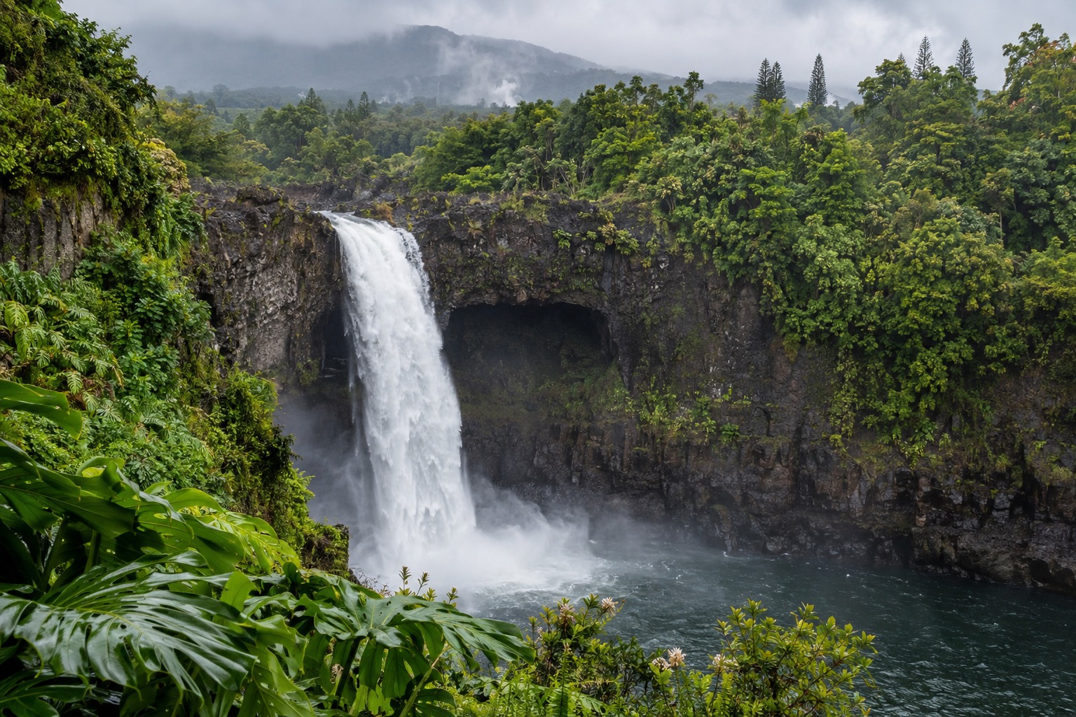 Rainbow Falls dropping into a plunge pool at Wailuku River State Park in Hilo