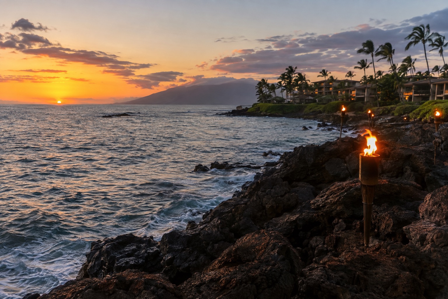 Torch flames burning along a lava point above the ocean at dusk