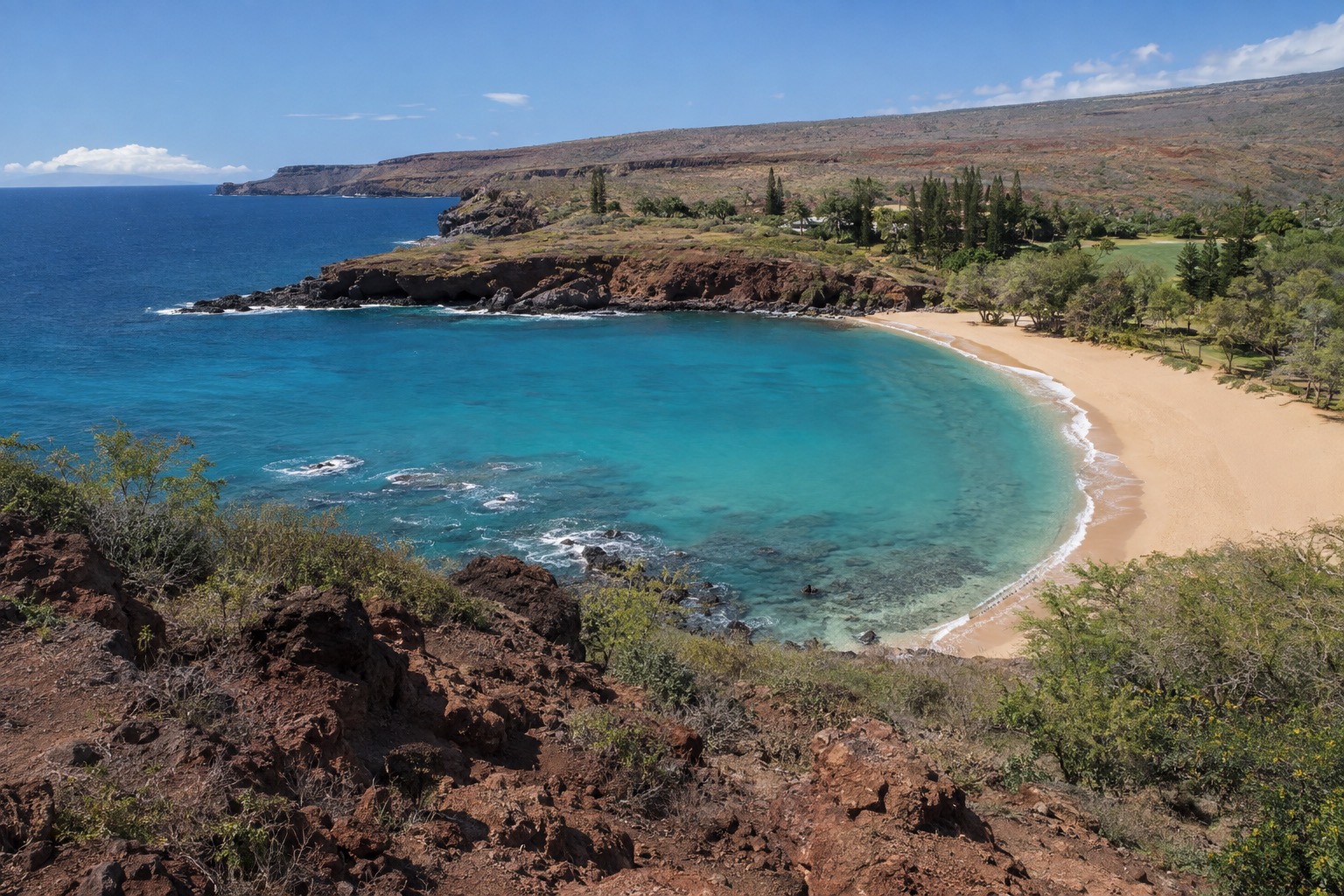 Turquoise water and a sandy crescent at Hulopoe Bay on Lanai's south shore