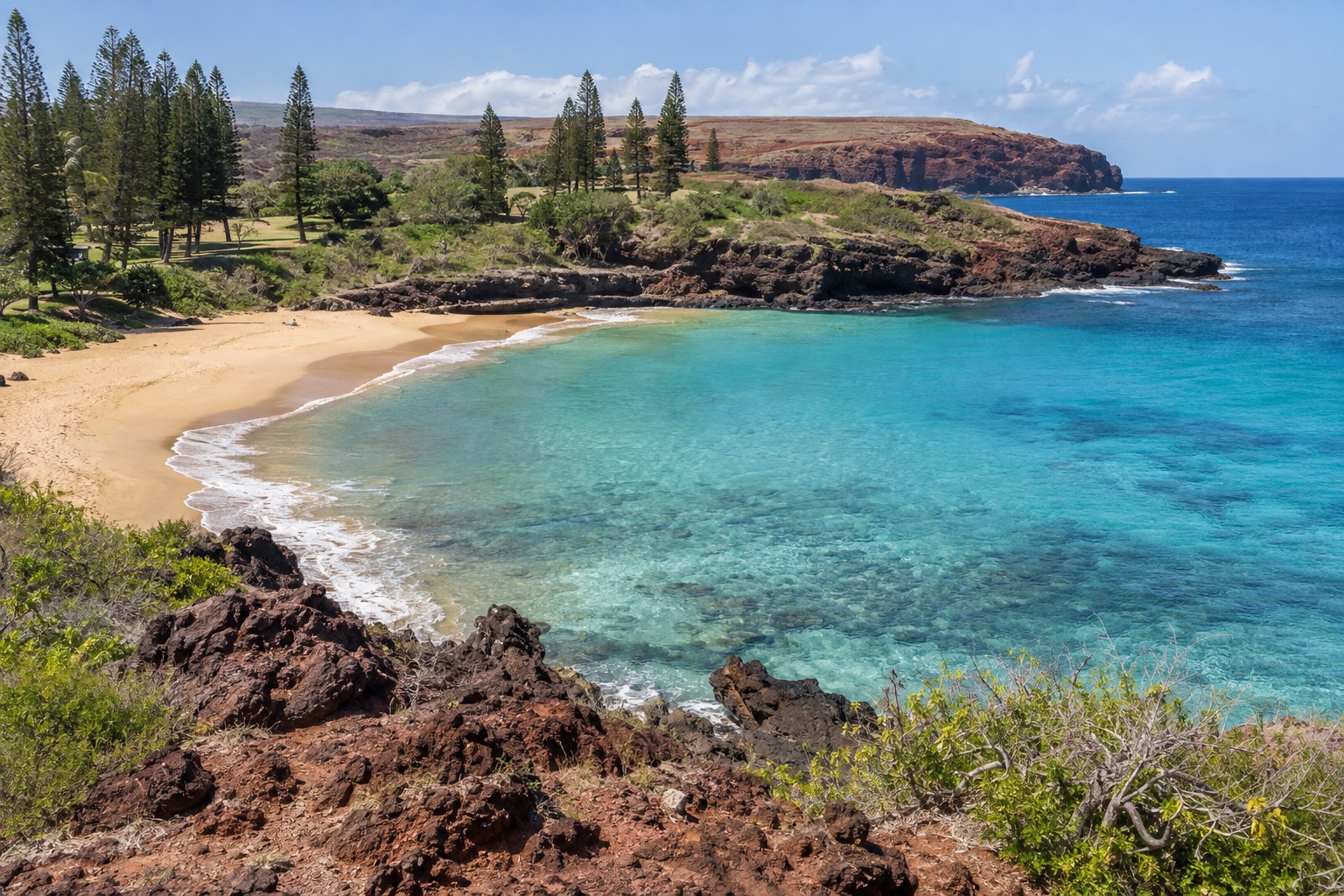 Turquoise water and a sandy cove at Hulopoe Bay on Lanai's south shore