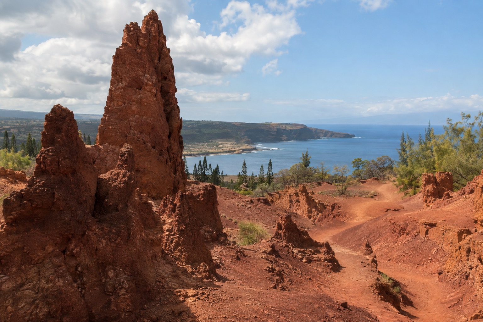 Red dirt trail and wind-carved rock towers at Keahiakawelo on Lanai