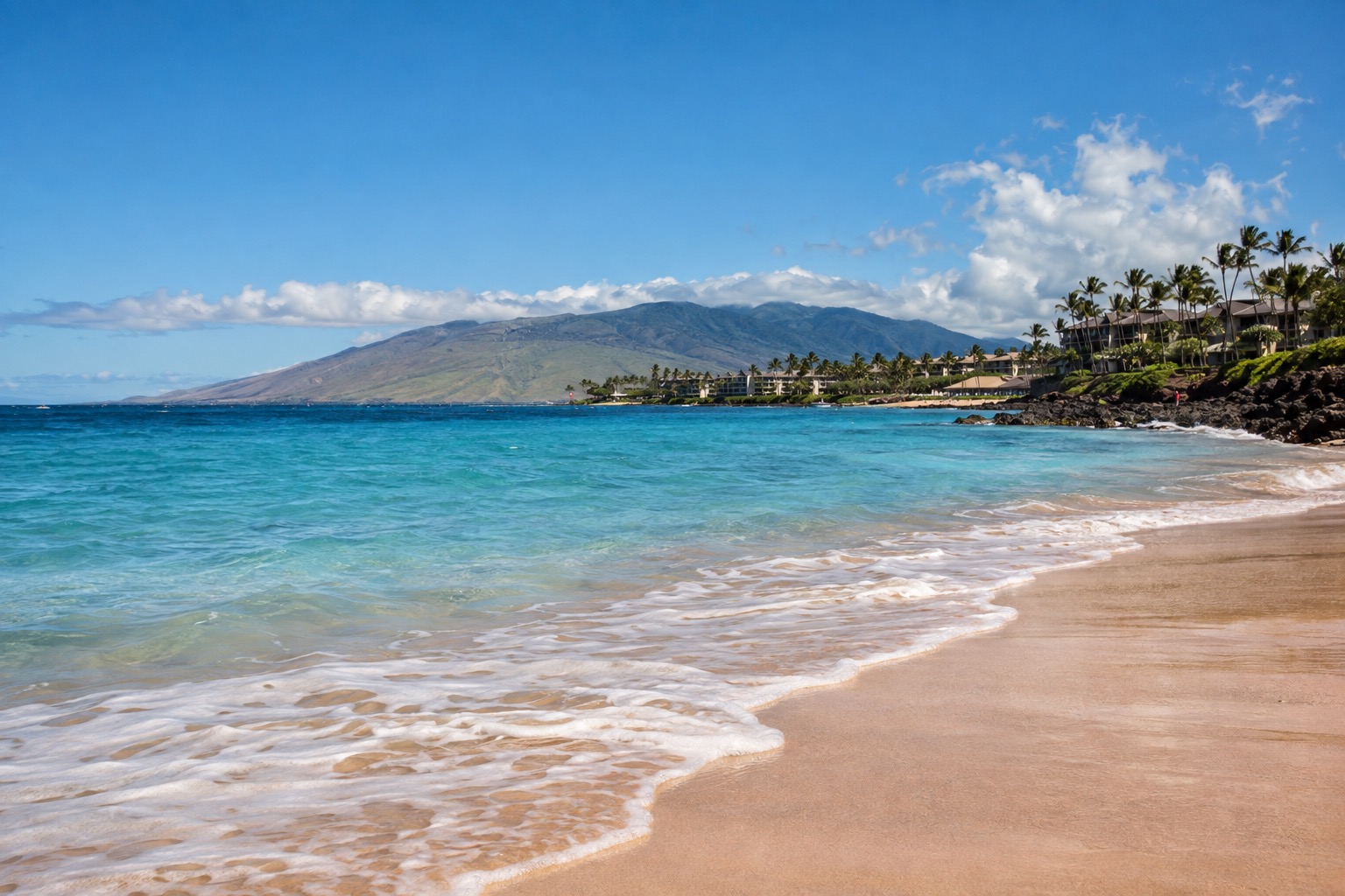 Turquoise water and white sand along Kaanapali Beach on Maui's west shore