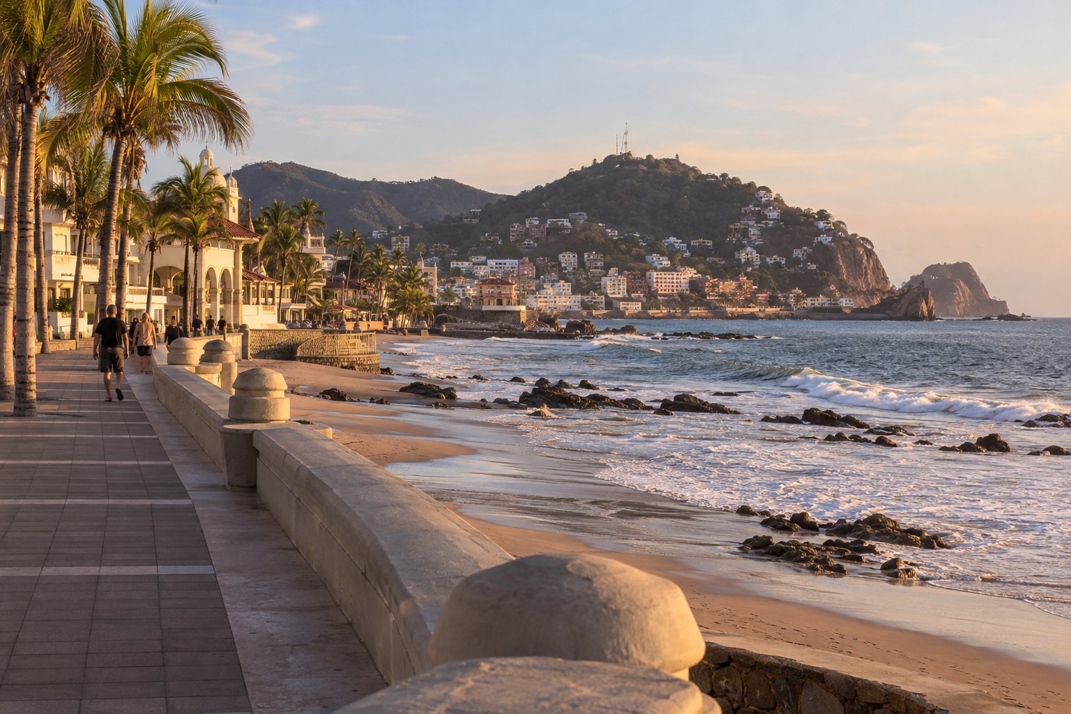A palm-lined oceanfront promenade beside the Pacific in Mazatlan, Mexico