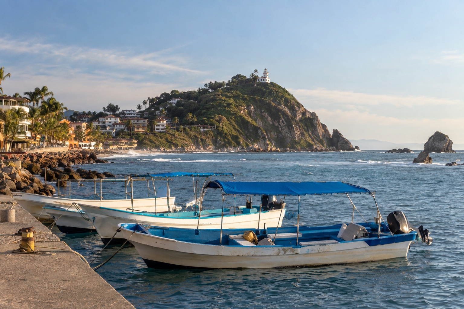 Small open passenger boats moored at a pier near a hilltop lighthouse in Mazatlan
