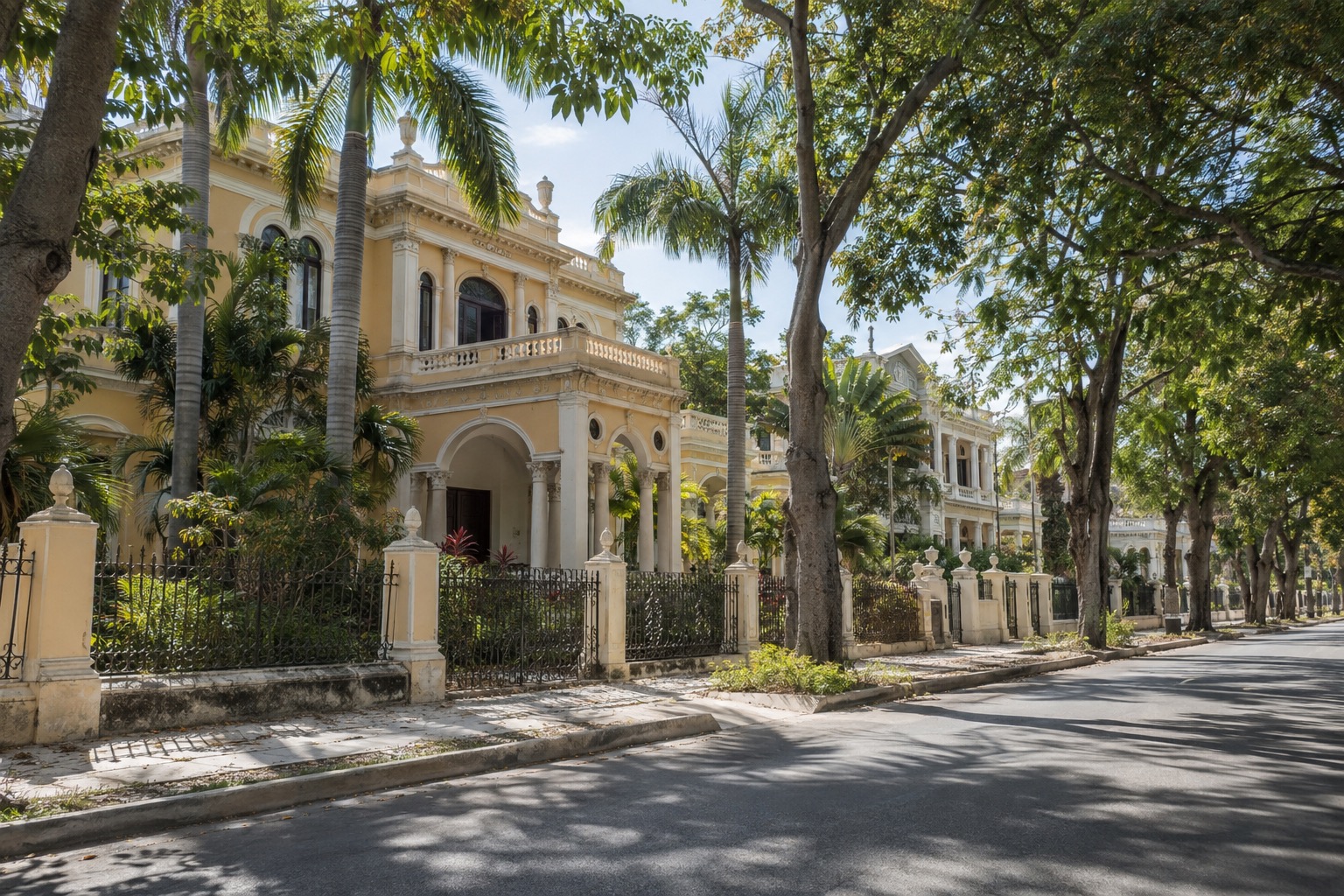 Tree-lined avenue with early twentieth-century mansions in Merida, Yucatan