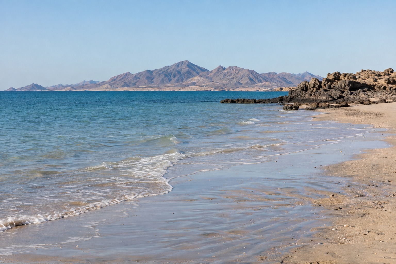 Sandy beach on the Sea of Cortez at Puerto Penasco in morning light