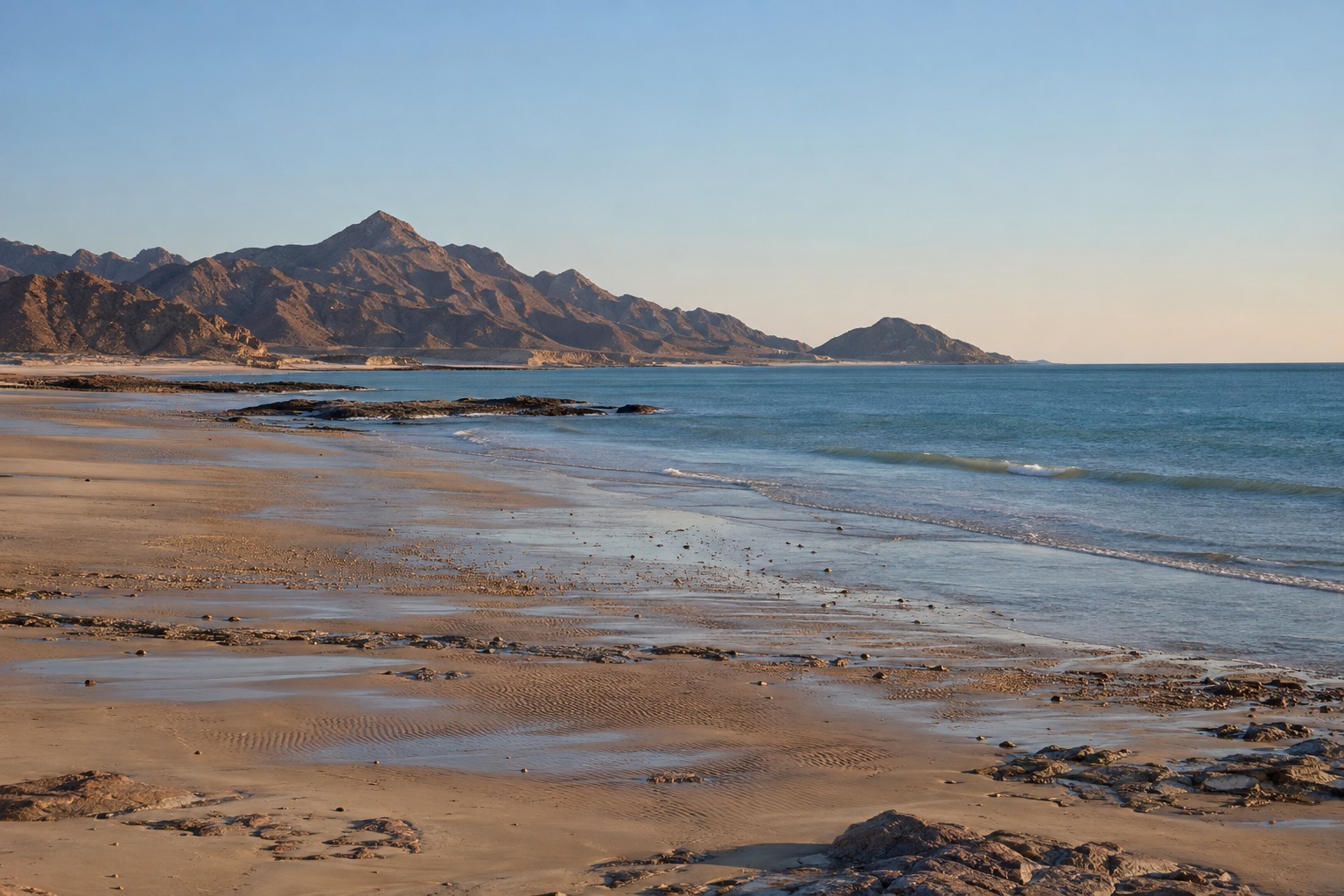 Empty sandy beach on the Sea of Cortez in low winter sunlight