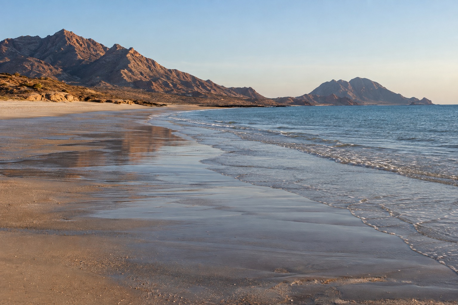 Empty sandy shoreline on the Sea of Cortez in low winter morning light