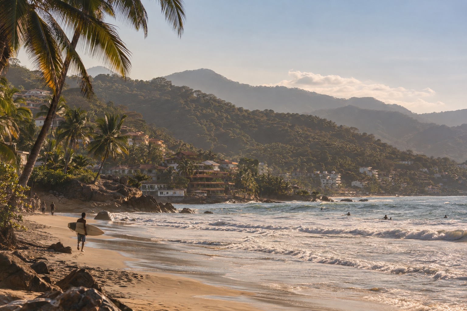 Palm trees and surfers along a sandy beach in a Pacific coast town