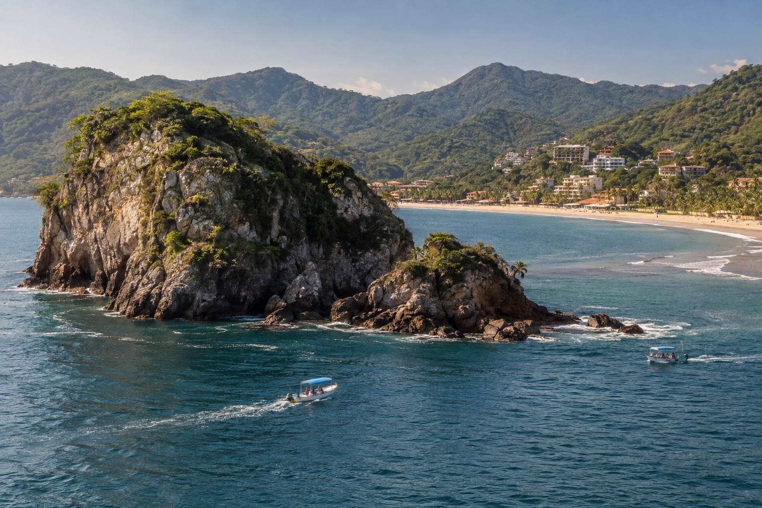 Small boats on turquoise water beside a rocky island off the Nayarit coast