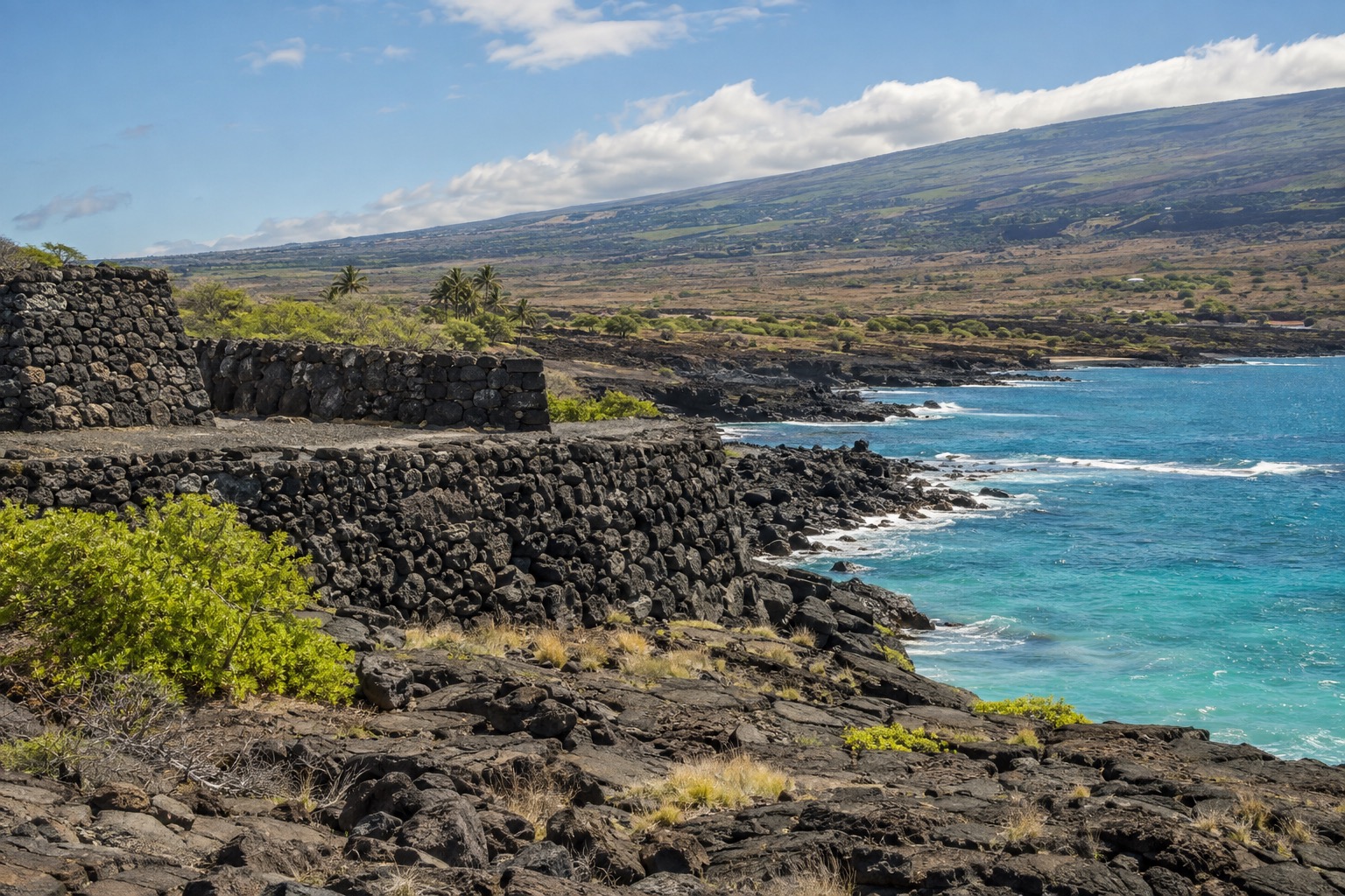 Stone platform temple walls of a heiau above the Kohala coastline