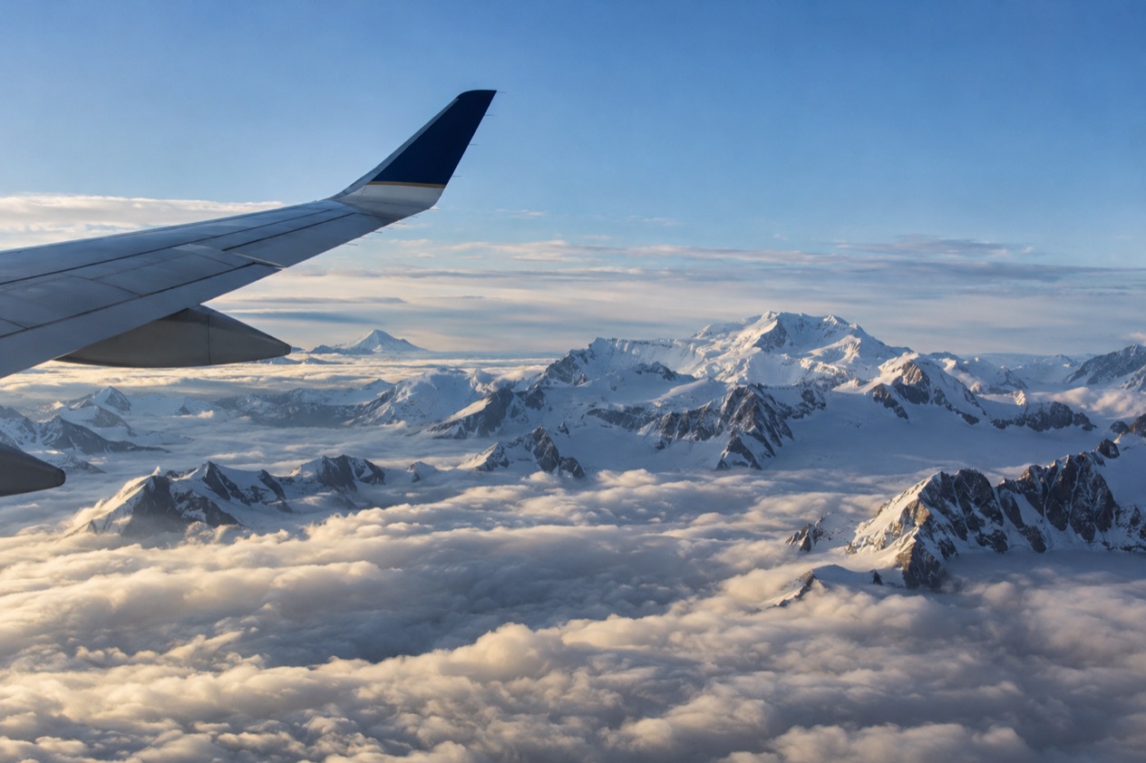 A wing above the clouds
