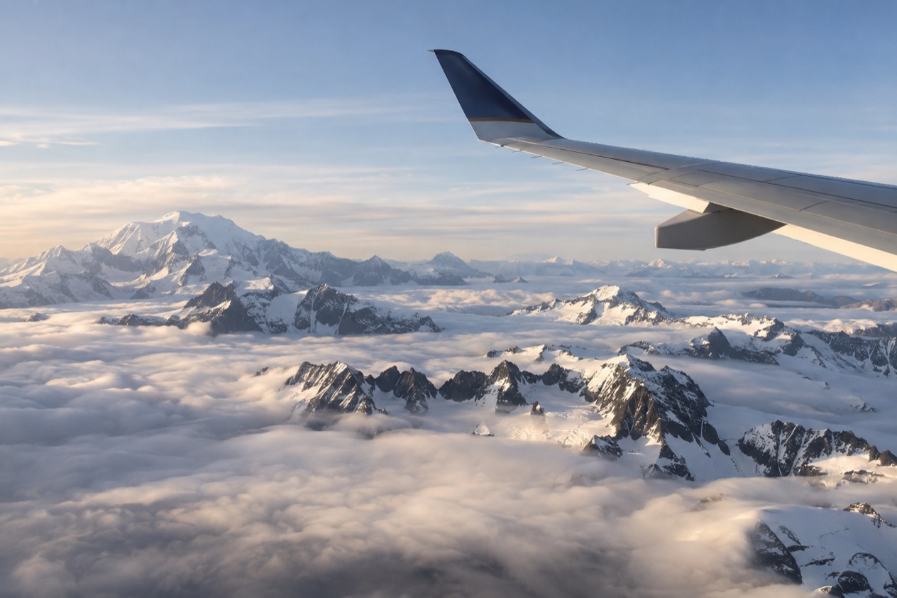 A wing above the clouds