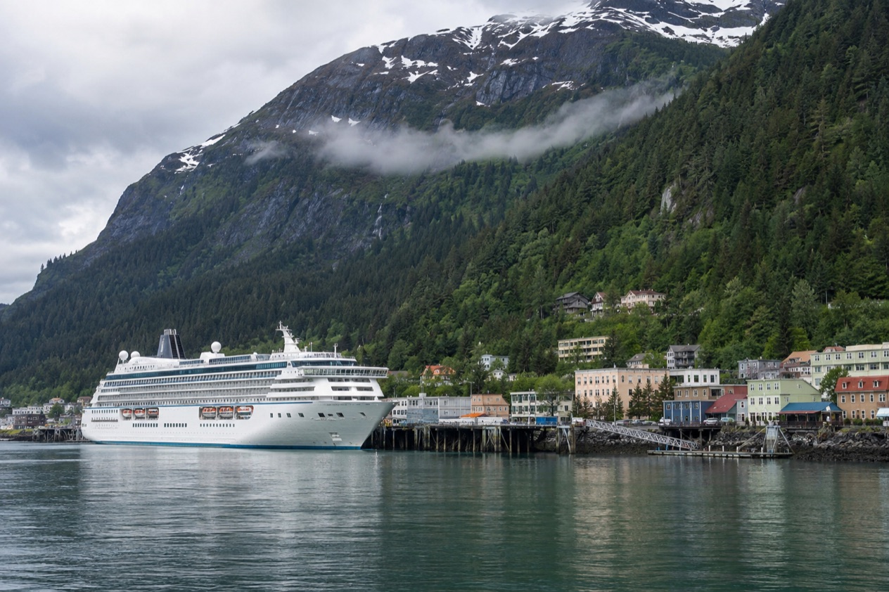 A cruise ship at a pier