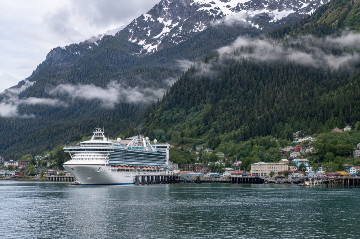 A cruise ship at a pier