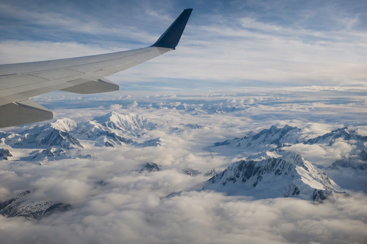 A wing above the clouds