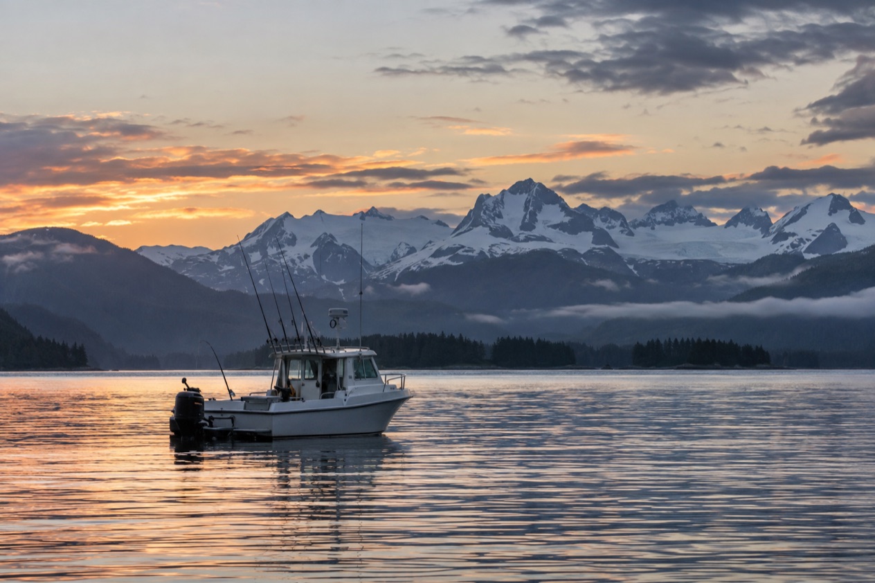 A fishing boat at dawn