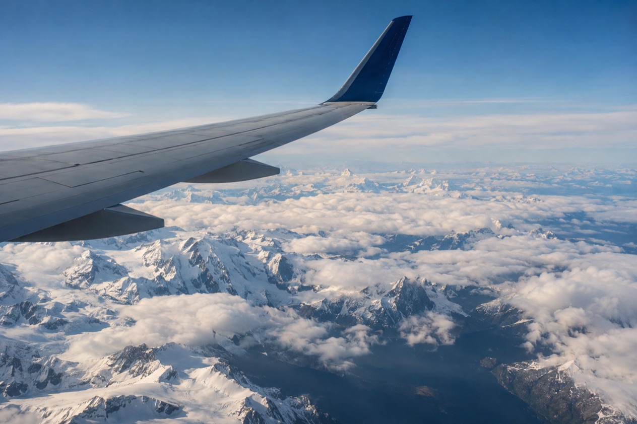 A wing above the clouds