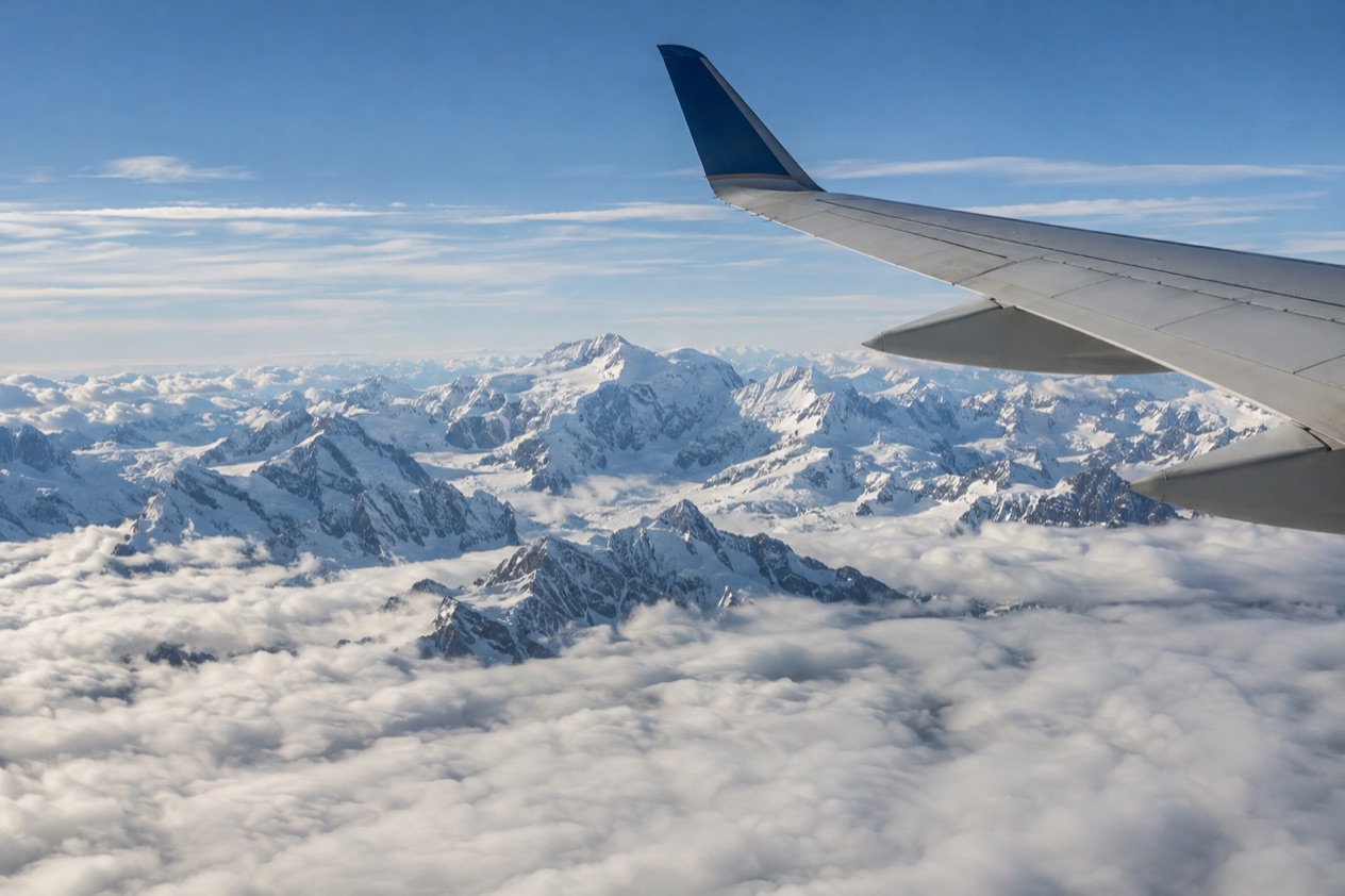 A wing above the clouds