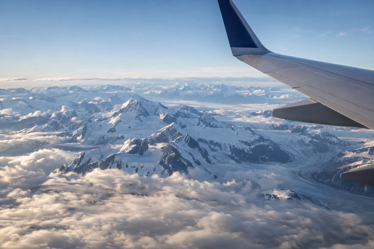 A wing above the clouds