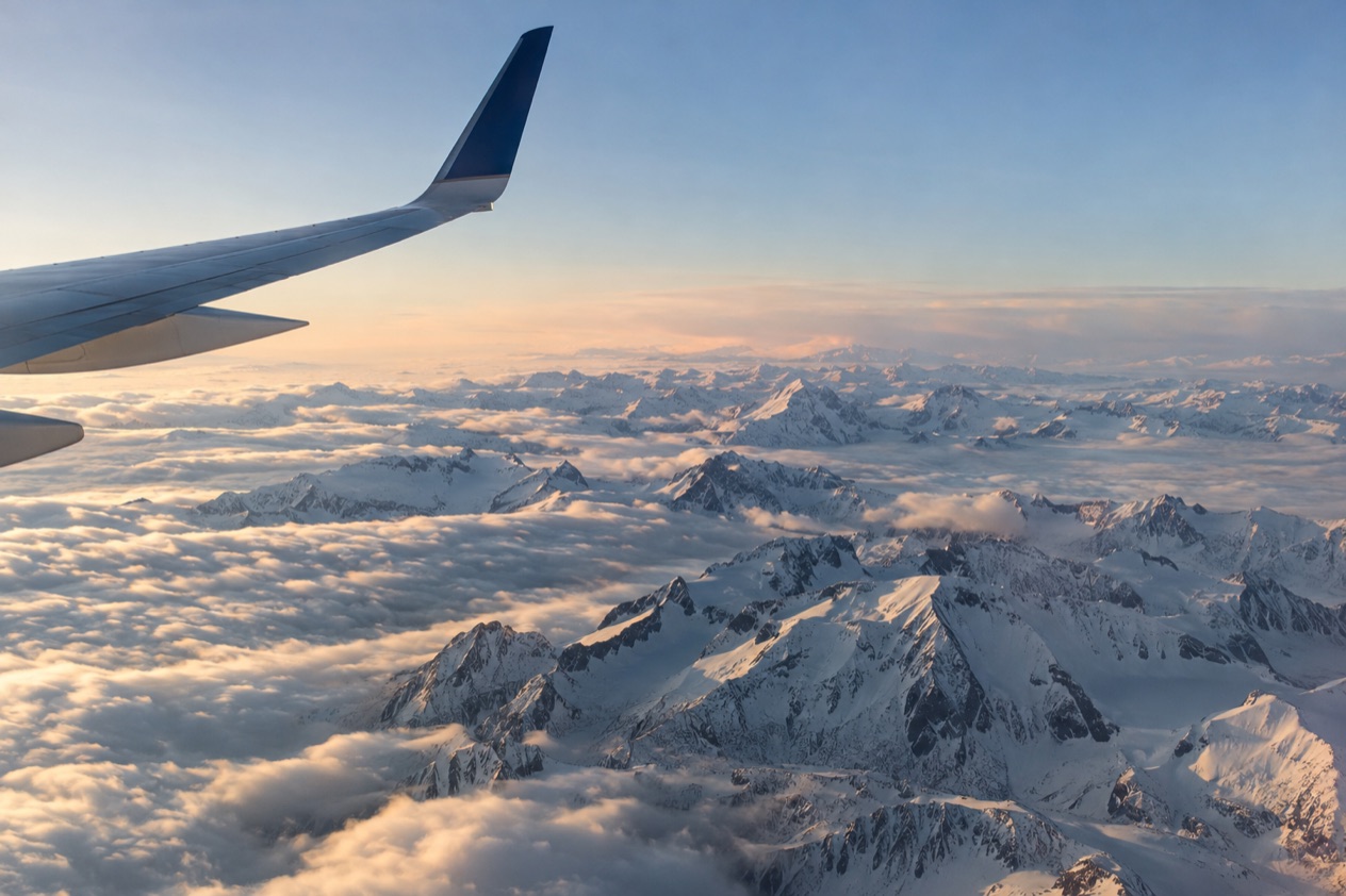 A wing above the clouds