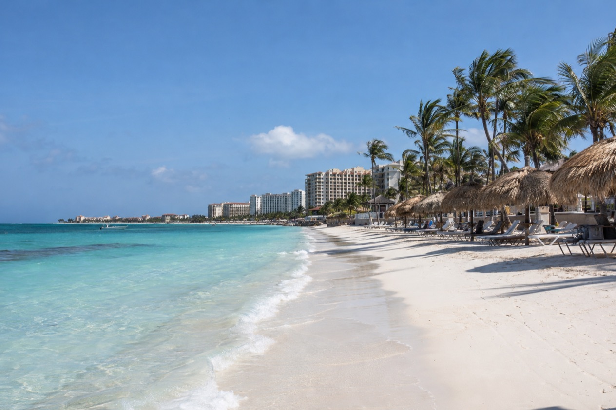 Palm Beach with its palapas and resorts