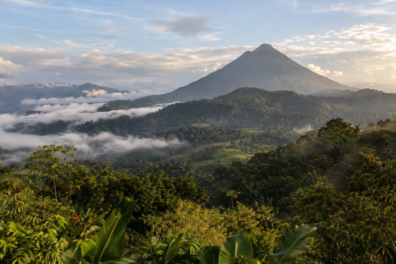 Green hills and a volcano in Costa Rica