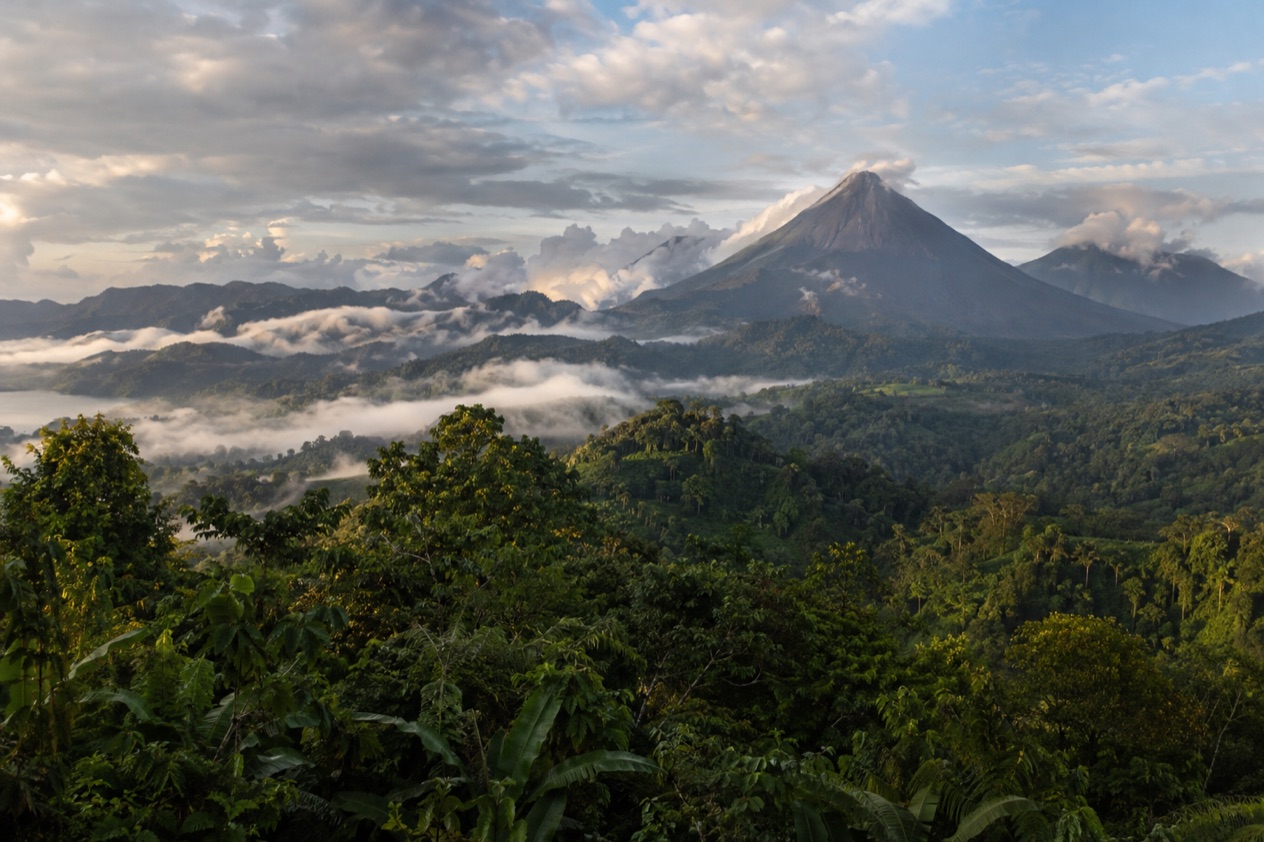 Green hills and a volcano in Costa Rica