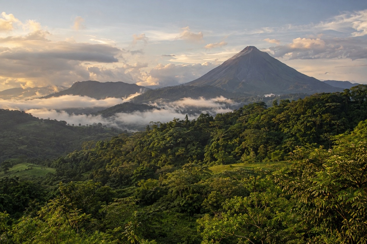 Green hills and a volcano in Costa Rica