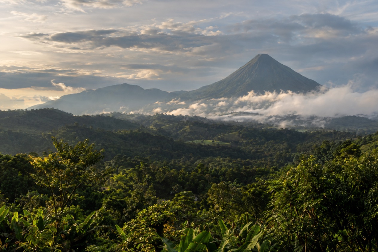 Green hills and a volcano in Costa Rica