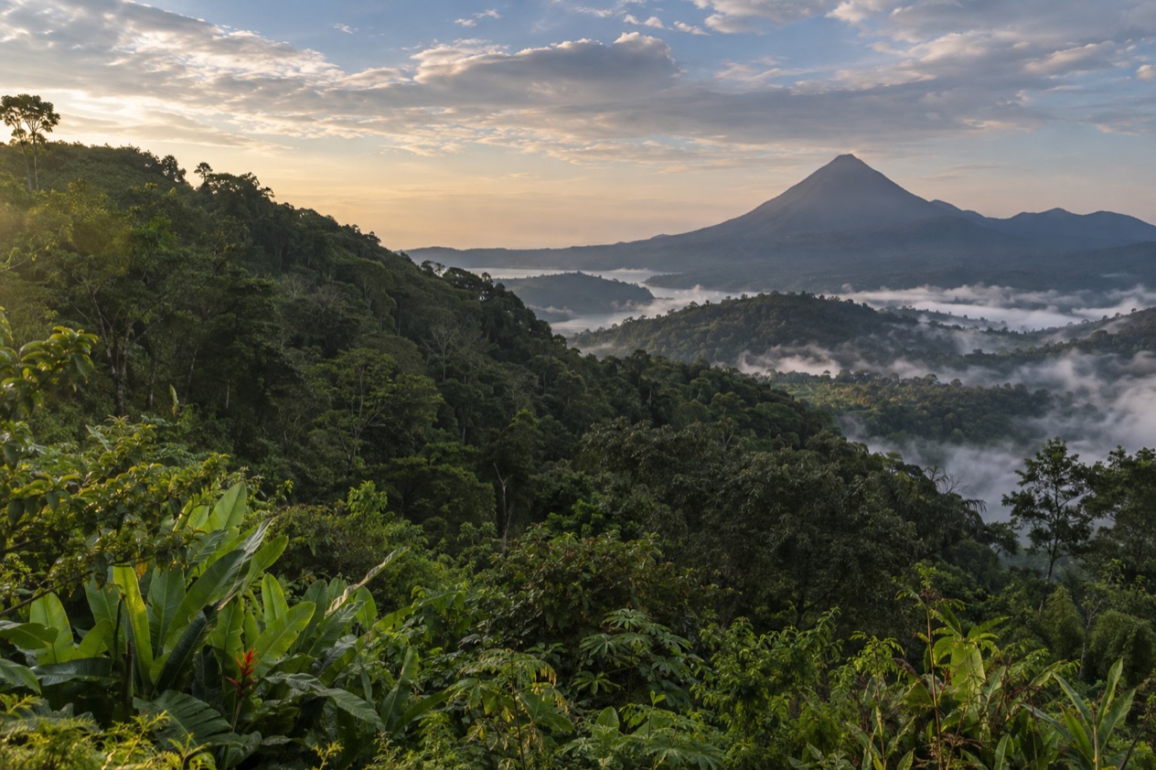 Green hills and a volcano in Costa Rica