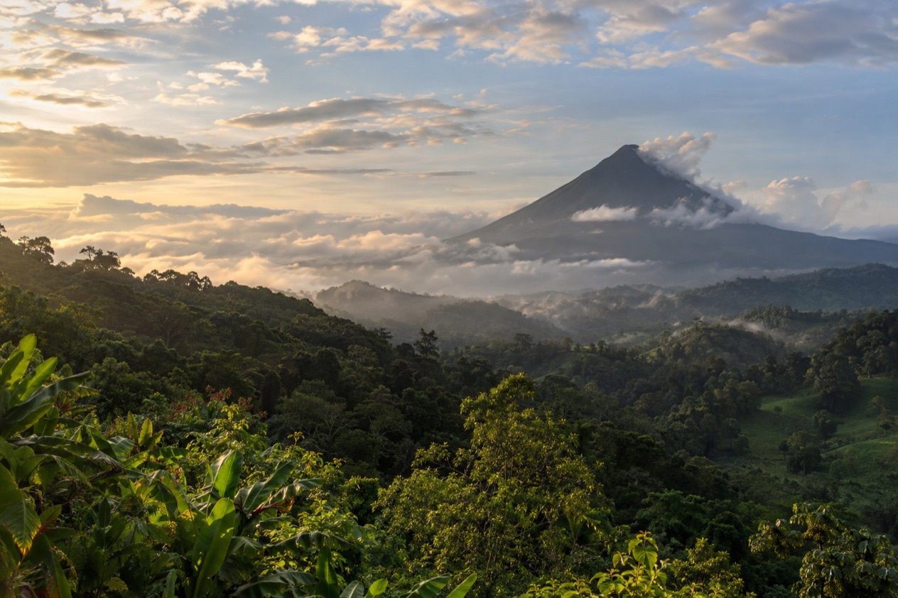 Green hills and a volcano in Costa Rica