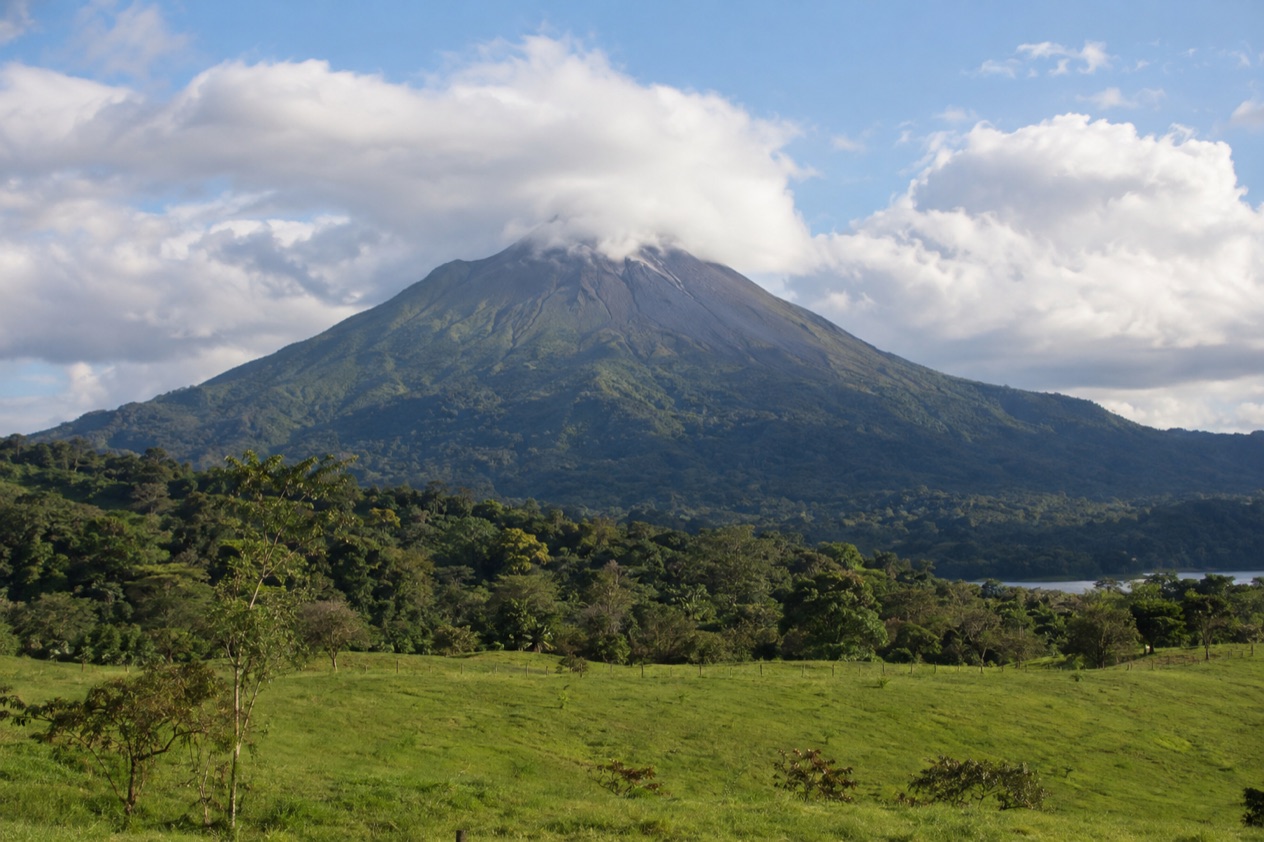 Arenal Volcano above the fields near La Fortuna