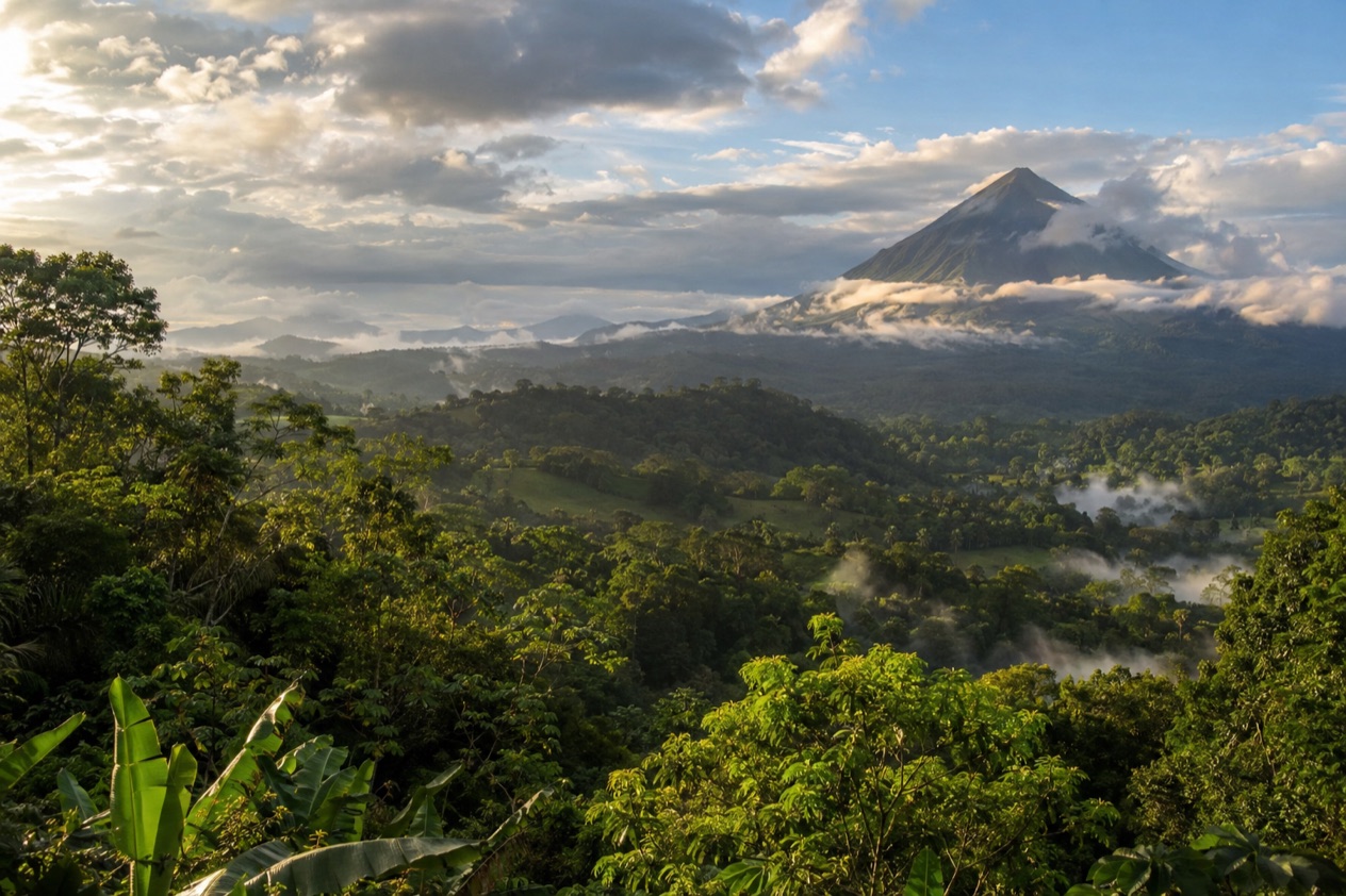 Green hills and a volcano in Costa Rica in the green season