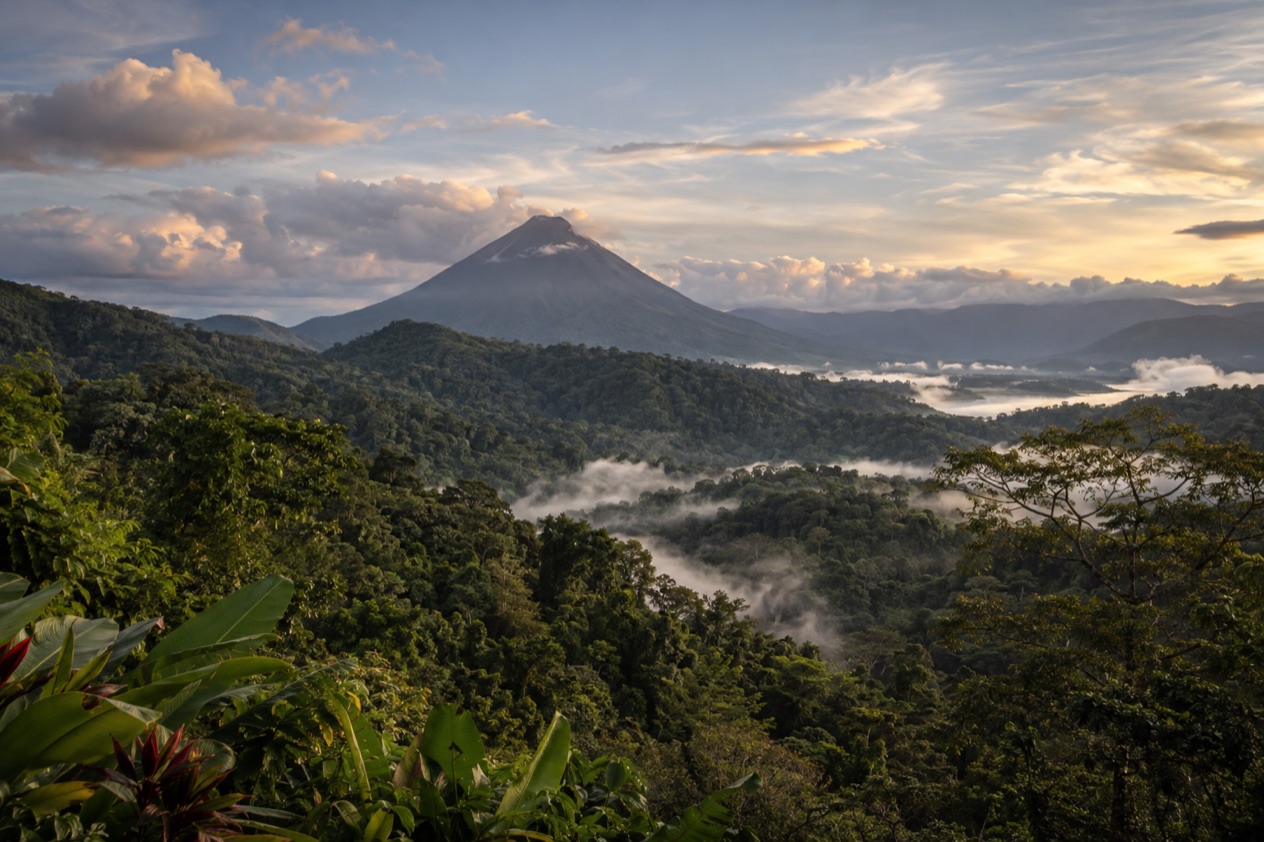 Green hills and a volcano in Costa Rica
