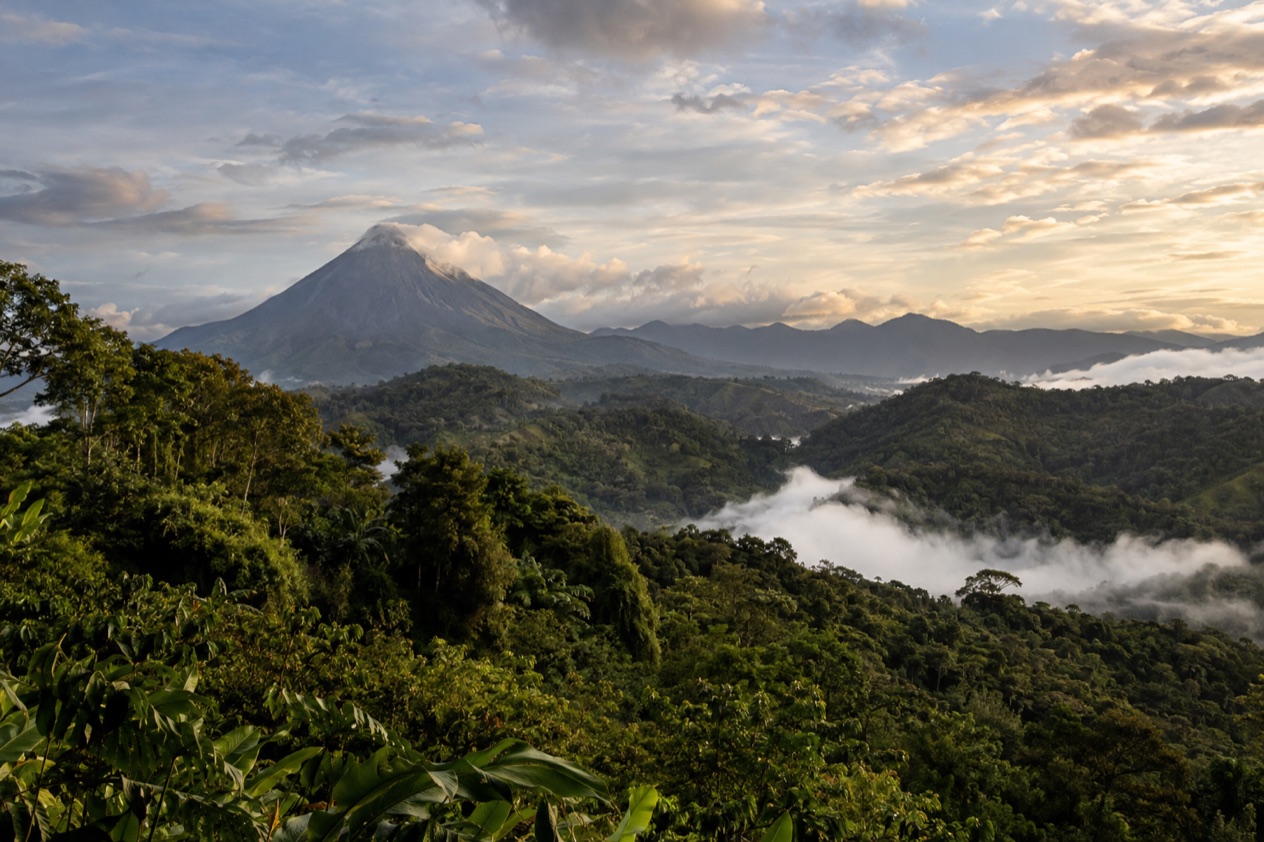Green hills and a volcano in Costa Rica