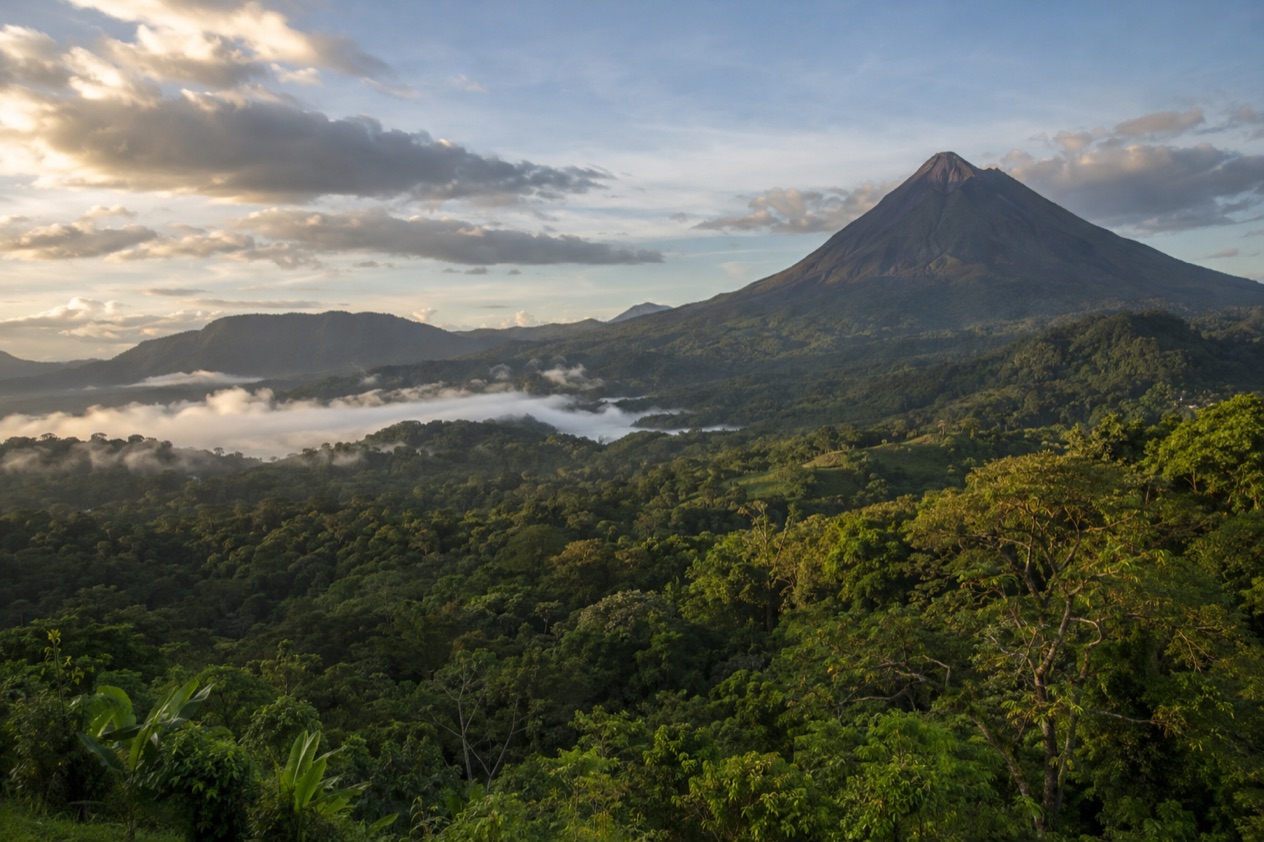 Green hills and a volcano in Costa Rica