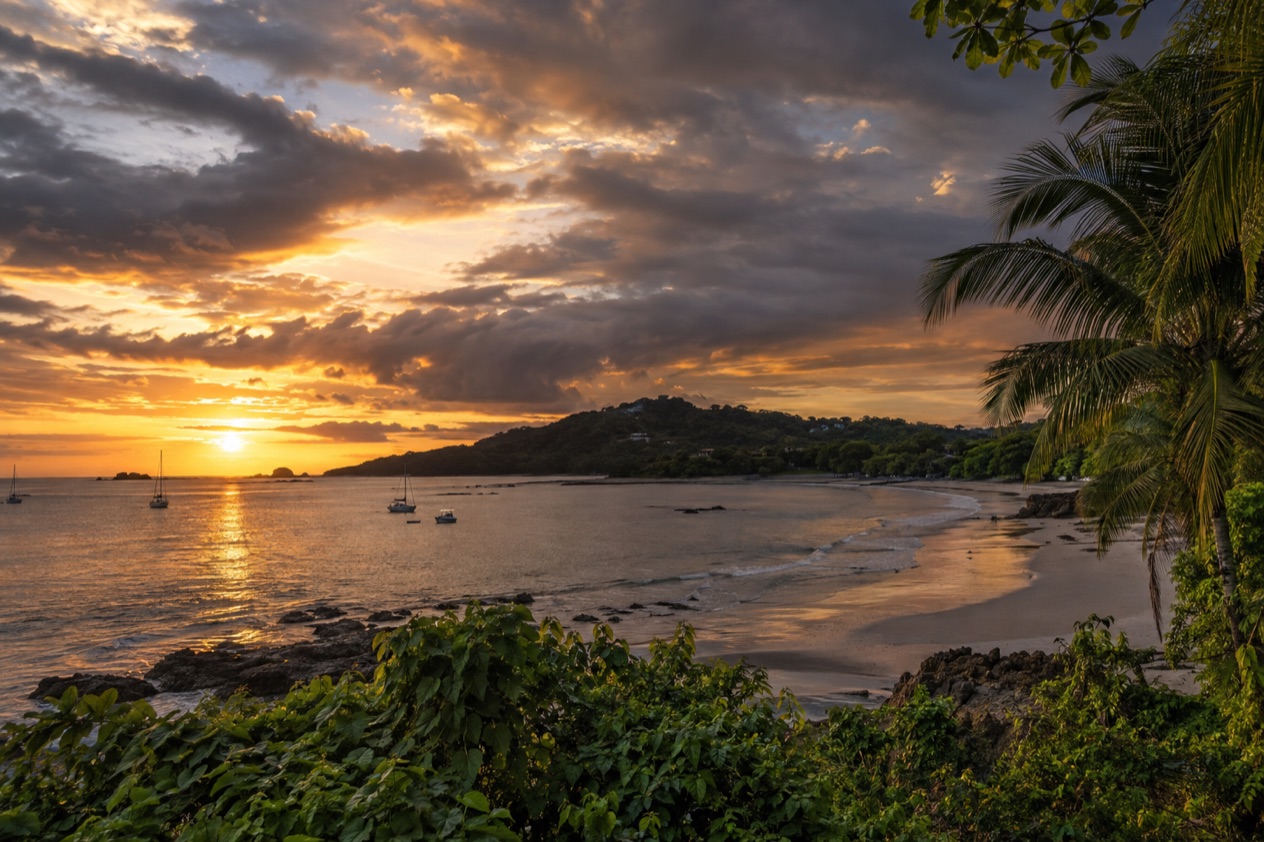 The beach at Tamarindo at sunset in the rainiest months