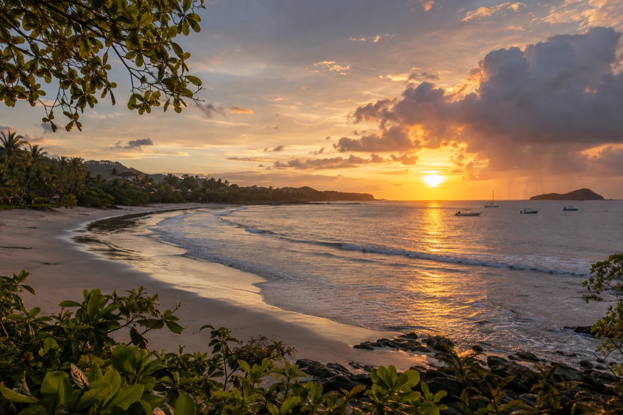 The beach at Tamarindo at sunset in the green season