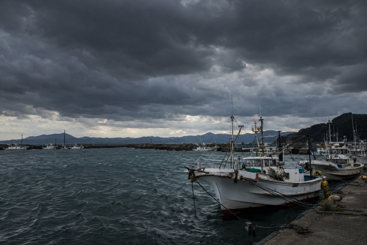 A storm over a Japanese harbor